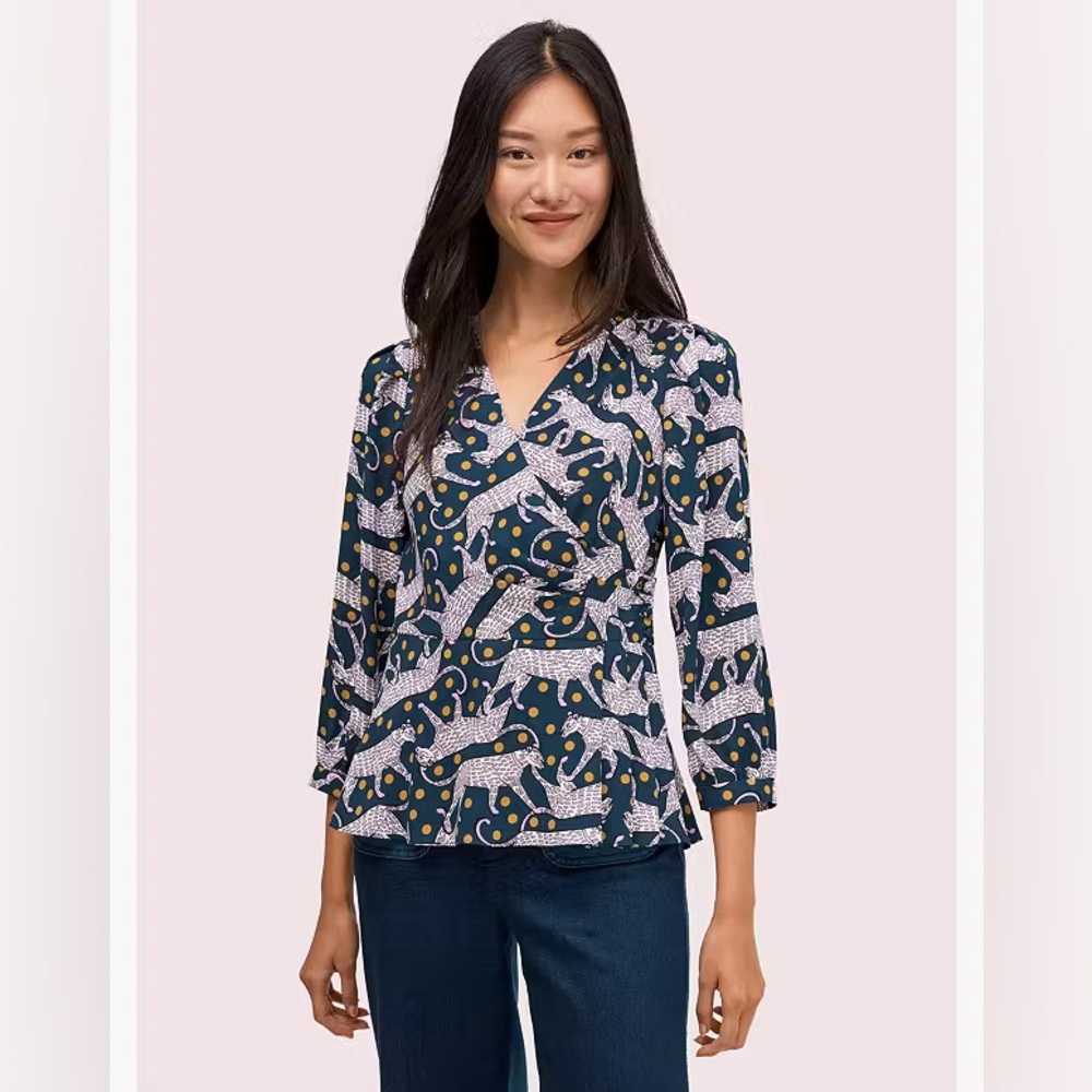 Lightly used Kate Spade Panther Dot Wrap Top Size 00